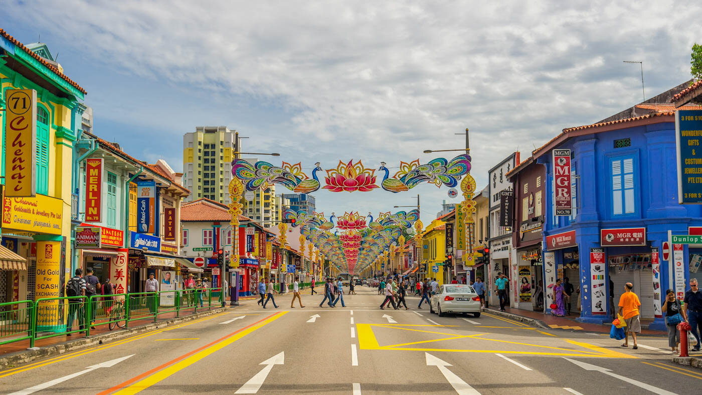 A colorful street in Little India, Singapore, with vibrant shophouses, traditional markets, and cultural landmarks, just minutes from ibis Singapore on Bencoolen.